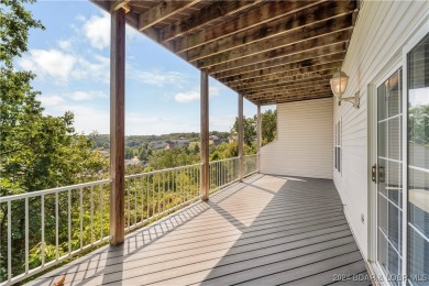 Discover this inviting 4-bedroom, 3-bathroom villa located in on Seasons Ridge At Four Seasons in Missouri - for sale on GolfHomes.com, golf home, golf lot