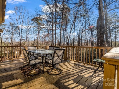 Modern farmhouse meets contemporary chic in this beautiful on Rumbling Bald Resort on Lake Lure in North Carolina - for sale on GolfHomes.com, golf home, golf lot