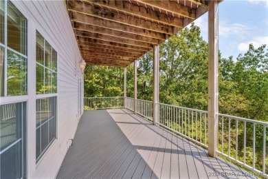 Discover this inviting 4-bedroom, 3-bathroom villa located in on Seasons Ridge At Four Seasons in Missouri - for sale on GolfHomes.com, golf home, golf lot