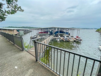 Discover this inviting 4-bedroom, 3-bathroom villa located in on Seasons Ridge At Four Seasons in Missouri - for sale on GolfHomes.com, golf home, golf lot