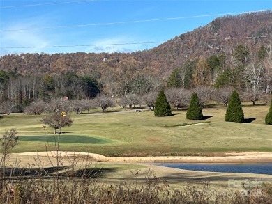 Modern farmhouse meets contemporary chic in this beautiful on Rumbling Bald Resort on Lake Lure in North Carolina - for sale on GolfHomes.com, golf home, golf lot