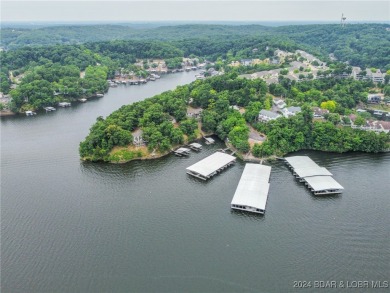 Discover this inviting 4-bedroom, 3-bathroom villa located in on Seasons Ridge At Four Seasons in Missouri - for sale on GolfHomes.com, golf home, golf lot