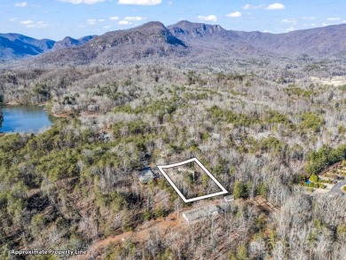 Modern farmhouse meets contemporary chic in this beautiful on Rumbling Bald Resort on Lake Lure in North Carolina - for sale on GolfHomes.com, golf home, golf lot