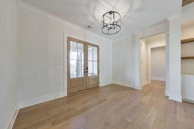 Welcome to this stunning 5 bedroom, 3.5 bathroom home in the on The Governors Towne Club in Georgia - for sale on GolfHomes.com, golf home, golf lot