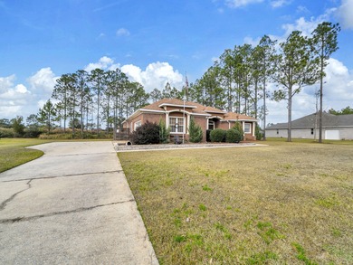 Beautiful all-brick home in a desirable golf course community on Windswept Dunes Golf Club in Florida - for sale on GolfHomes.com, golf home, golf lot