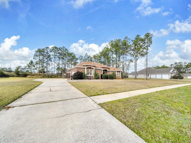 Beautiful all-brick home in a desirable golf course community on Windswept Dunes Golf Club in Florida - for sale on GolfHomes.com, golf home, golf lot