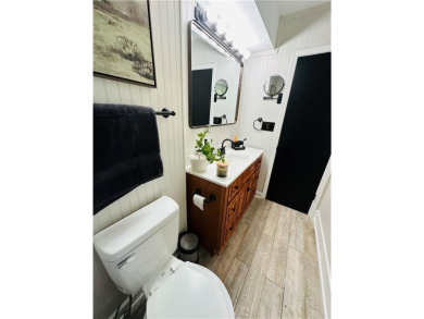 Beautifully updated with an open floor plan, this charming on Royal Meadows Golf Course in Missouri - for sale on GolfHomes.com, golf home, golf lot