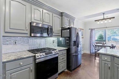 Perfectly positioned along the 10th fairway of Bay Pointe Golf on Bay Pointe Golf and Resort in Mississippi - for sale on GolfHomes.com, golf home, golf lot