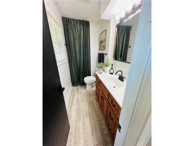 Beautifully updated with an open floor plan, this charming on Royal Meadows Golf Course in Missouri - for sale on GolfHomes.com, golf home, golf lot
