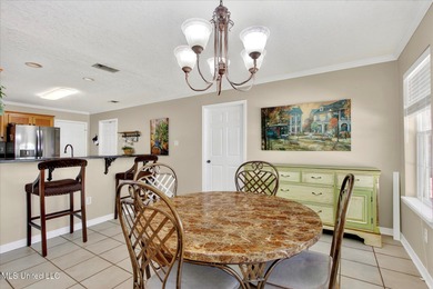 Beautifully maintained and move-in ready on a quiet Diamondhead on Diamondhead Country Club in Mississippi - for sale on GolfHomes.com, golf home, golf lot