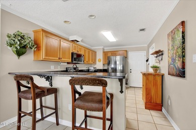 Beautifully maintained and move-in ready on a quiet Diamondhead on Diamondhead Country Club in Mississippi - for sale on GolfHomes.com, golf home, golf lot