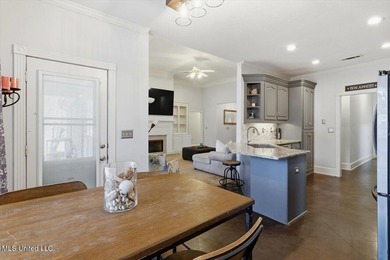 Perfectly positioned along the 10th fairway of Bay Pointe Golf on Bay Pointe Golf and Resort in Mississippi - for sale on GolfHomes.com, golf home, golf lot