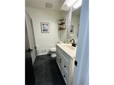 Beautifully updated with an open floor plan, this charming on Royal Meadows Golf Course in Missouri - for sale on GolfHomes.com, golf home, golf lot