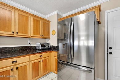 Beautifully maintained and move-in ready on a quiet Diamondhead on Diamondhead Country Club in Mississippi - for sale on GolfHomes.com, golf home, golf lot