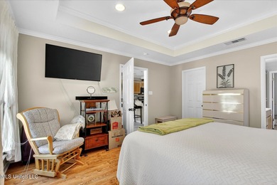 Beautifully maintained and move-in ready on a quiet Diamondhead on Diamondhead Country Club in Mississippi - for sale on GolfHomes.com, golf home, golf lot