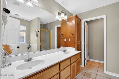 Beautifully maintained and move-in ready on a quiet Diamondhead on Diamondhead Country Club in Mississippi - for sale on GolfHomes.com, golf home, golf lot