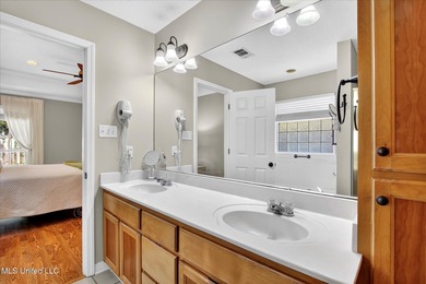 Beautifully maintained and move-in ready on a quiet Diamondhead on Diamondhead Country Club in Mississippi - for sale on GolfHomes.com, golf home, golf lot