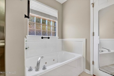 Beautifully maintained and move-in ready on a quiet Diamondhead on Diamondhead Country Club in Mississippi - for sale on GolfHomes.com, golf home, golf lot