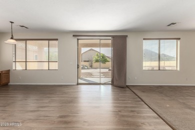 Stunning two-story residence with manicured landscape and 3-car on Southern Ridge Golf Club in Arizona - for sale on GolfHomes.com, golf home, golf lot