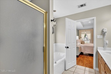 Beautifully maintained and move-in ready on a quiet Diamondhead on Diamondhead Country Club in Mississippi - for sale on GolfHomes.com, golf home, golf lot