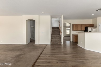 Stunning two-story residence with manicured landscape and 3-car on Southern Ridge Golf Club in Arizona - for sale on GolfHomes.com, golf home, golf lot