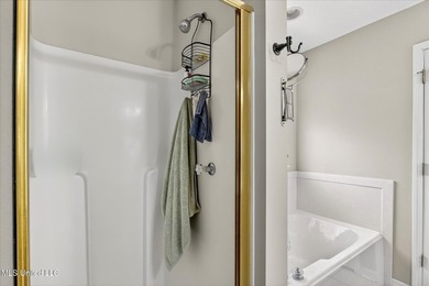 Beautifully maintained and move-in ready on a quiet Diamondhead on Diamondhead Country Club in Mississippi - for sale on GolfHomes.com, golf home, golf lot