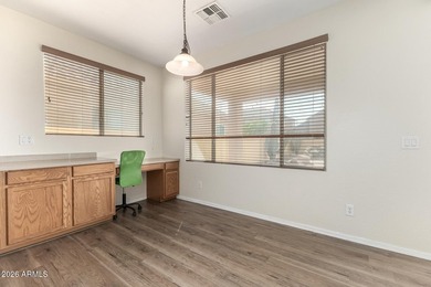 Stunning two-story residence with manicured landscape and 3-car on Southern Ridge Golf Club in Arizona - for sale on GolfHomes.com, golf home, golf lot