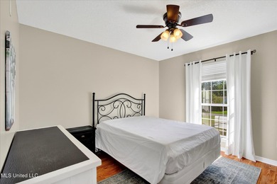 Beautifully maintained and move-in ready on a quiet Diamondhead on Diamondhead Country Club in Mississippi - for sale on GolfHomes.com, golf home, golf lot