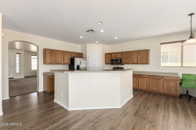 Stunning two-story residence with manicured landscape and 3-car on Southern Ridge Golf Club in Arizona - for sale on GolfHomes.com, golf home, golf lot