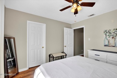 Beautifully maintained and move-in ready on a quiet Diamondhead on Diamondhead Country Club in Mississippi - for sale on GolfHomes.com, golf home, golf lot