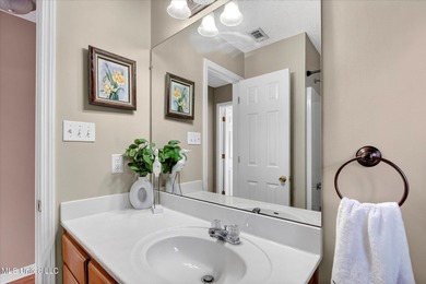 Beautifully maintained and move-in ready on a quiet Diamondhead on Diamondhead Country Club in Mississippi - for sale on GolfHomes.com, golf home, golf lot