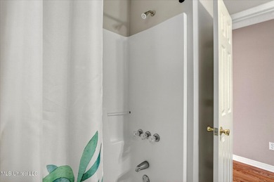 Beautifully maintained and move-in ready on a quiet Diamondhead on Diamondhead Country Club in Mississippi - for sale on GolfHomes.com, golf home, golf lot