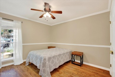 Beautifully maintained and move-in ready on a quiet Diamondhead on Diamondhead Country Club in Mississippi - for sale on GolfHomes.com, golf home, golf lot