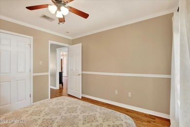 Beautifully maintained and move-in ready on a quiet Diamondhead on Diamondhead Country Club in Mississippi - for sale on GolfHomes.com, golf home, golf lot