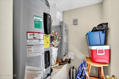 Beautifully maintained and move-in ready on a quiet Diamondhead on Diamondhead Country Club in Mississippi - for sale on GolfHomes.com, golf home, golf lot