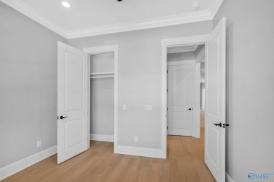 Located in Gunter's Landing Golf Club, this lake view villa on Gunters Landing in Alabama - for sale on GolfHomes.com, golf home, golf lot