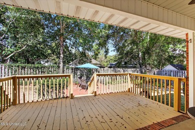 Beautifully maintained and move-in ready on a quiet Diamondhead on Diamondhead Country Club in Mississippi - for sale on GolfHomes.com, golf home, golf lot