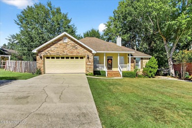 Beautifully maintained and move-in ready on a quiet Diamondhead on Diamondhead Country Club in Mississippi - for sale on GolfHomes.com, golf home, golf lot