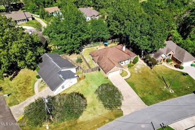 Beautifully maintained and move-in ready on a quiet Diamondhead on Diamondhead Country Club in Mississippi - for sale on GolfHomes.com, golf home, golf lot