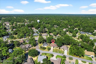 Beautifully maintained and move-in ready on a quiet Diamondhead on Diamondhead Country Club in Mississippi - for sale on GolfHomes.com, golf home, golf lot