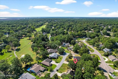 Beautifully maintained and move-in ready on a quiet Diamondhead on Diamondhead Country Club in Mississippi - for sale on GolfHomes.com, golf home, golf lot