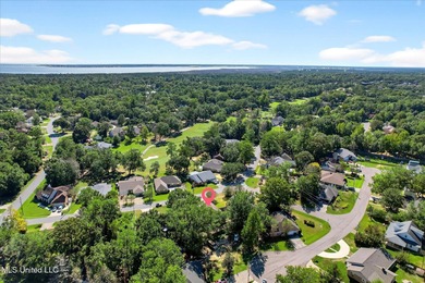 Beautifully maintained and move-in ready on a quiet Diamondhead on Diamondhead Country Club in Mississippi - for sale on GolfHomes.com, golf home, golf lot