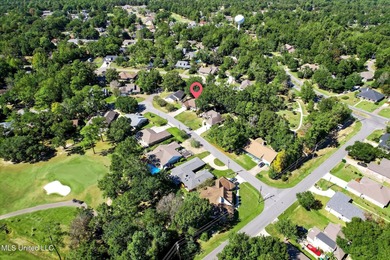 Beautifully maintained and move-in ready on a quiet Diamondhead on Diamondhead Country Club in Mississippi - for sale on GolfHomes.com, golf home, golf lot