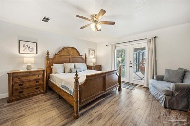 Northwest Florida living at its finest, and this one truly on Perdido Bay Golf Club in Florida - for sale on GolfHomes.com, golf home, golf lot