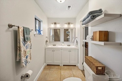 Northwest Florida living at its finest, and this one truly on Perdido Bay Golf Club in Florida - for sale on GolfHomes.com, golf home, golf lot