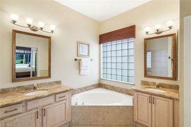 This impeccably maintained residence is nestled within Laurel on Shadow Wood Country Club in Florida - for sale on GolfHomes.com, golf home, golf lot