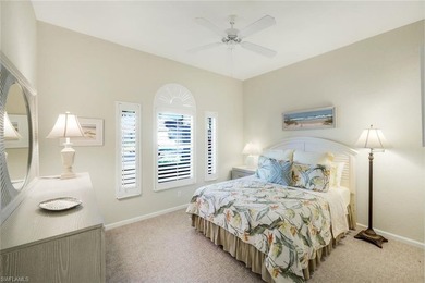 This impeccably maintained residence is nestled within Laurel on Shadow Wood Country Club in Florida - for sale on GolfHomes.com, golf home, golf lot