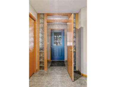 This custom-built, 5 BD/3 BA brick rambler is a rare find on Spring Valley Golf Course in Wisconsin - for sale on GolfHomes.com, golf home, golf lot