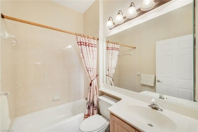 This impeccably maintained residence is nestled within Laurel on Shadow Wood Country Club in Florida - for sale on GolfHomes.com, golf home, golf lot