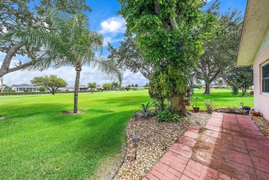 Welcome to this charming 2-bedroom, 2-bathroom home located in a on Cypress Lakes Golf Course - West Palm Beach in Florida - for sale on GolfHomes.com, golf home, golf lot